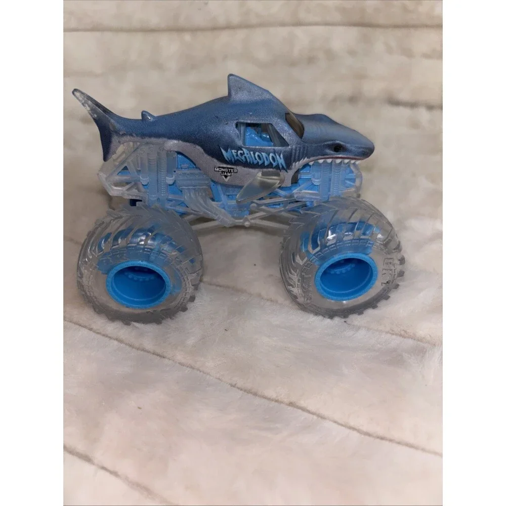 Monster Jam Megalodon Shark Monster Truck 1:64 Scale Clear Ice Tires Translucent